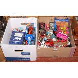 Two boxes of Diecast vehicles to include Corgi super haulers, limited edition milk truck set etc.