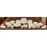 Approximately 80 pieces of Shelley white tableware to include cups, saucers, teapot, covered dish