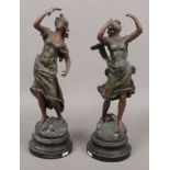 Two Spelter figures of maidens on stands, one Premier Miroir and the other the Messenger.