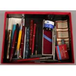 A tray lot of pens and writing accessories to include 14ct gold nib blackbird fountain pen,