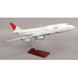 A boxed model of a Japan Airlines Boeing 747 on stand, length 50cm.