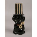 A Beatson Clark glass novelty scent bottle formed as a seated dog in a top hat, registered No to