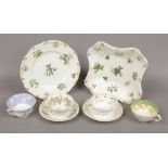 A collection of Rockingham to include red griffin marked plate with green floral decoration, cups