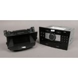 A Delphi Grundig CD30 head unit for Vauxhall / Opel Corsa / Astra to include Johnson controls ABS