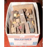 A box of vintage wooden building blocks.