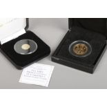 Two cased commemorative gold coins to include 9ct gold year of the three Kings double crown and a