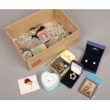 A box of costume jewellery and collectables including Swarovski ear stud, Monet, pave and other