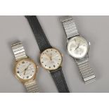 Three gentleman's manual wristwatches. Everite with centre seconds and date display, Timex with