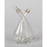 A George V silver mounted glass conjoined oil and vinegar bottle with stoppers. Assayed Sheffield