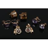 Four pairs of mid 20th century yellow metal screw back and clip on earrings. Smokey quartz, amethyst