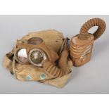 A World War II No. 4A box respirator gas mask in canvas haversack. Makers Barringer, Wallis &