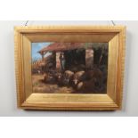 An early 20th century gilt framed oil on canvas. Mediterranean scene with a shepherd and flock by