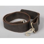 A World War I pattern British Army leather belt with serpent formed buckle. Some slight cracking