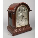 An early 20th century mahogany dome top triple fusee 8 day bracket clock by Winterhalder and