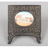 A 19th century Anglo Indian miniature painting on ivory in carved ebony strut frame. Depicting a