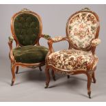 A pair of Victorian carved walnut parlour armchairs. With ormolu mounts and raised on scroll