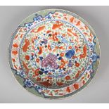 An 18th century Chinese large pan topped bowl. With clobbered decoration in underglaze blue and