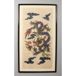 A pair of large 20th century Chinese wood block prints. Each depicting a dragon chasing a flaming