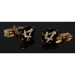 A pair of 9 carat gold and onyx Masonic cufflinks. Good condition.