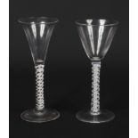 A Georgian double series opaque twist wine glass with conical bowl, along with another example