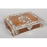 An early 19th century Indian Vizagapatam ivory inlaid rosewood writing box. Decorated with scrolling