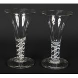 A large pair of late 18th / early 19th century glass drinking goblets. With trumpet shaped bowls