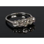A platinum five stone diamond ring set with graduated Old European cut stones, approximately 1.1ct