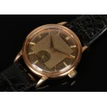 A gentleman's 18 carat gold cased Movado Automatic Gentleman wristwatch. With gold dial having baton