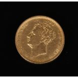 A William IV full sovereign 1827. Bare head portrait of George IV by J.B. Merlen on the Obverse. The
