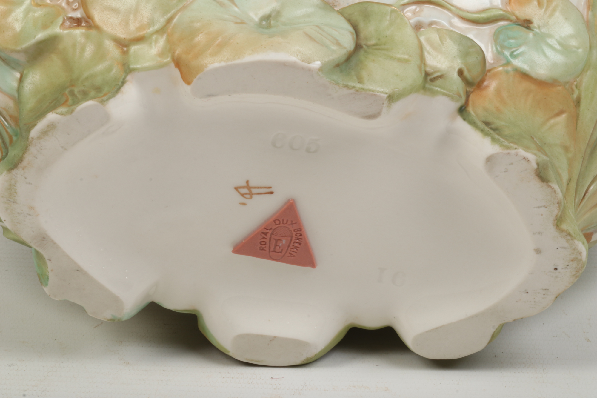 A Royal Dux posy bowl. Surmounted with the figure of a maiden and moulded with water lilys. - Image 2 of 2