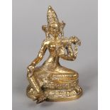 A Sino Tibetan cast bronze small devotional statue of a seated Buddha, 17.5cm.