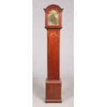 A George V mahogany cased granddaughter clock. With brass arch top dial and incorporating an 8 day