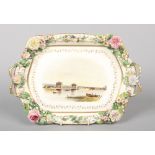 A large Rockingham card tray with C-scroll moulding, delicate twig handles and applied Dresden