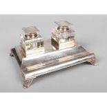 A Victorian silver presentation desk stand by Robert Pringle & Sons. Incorporating an original