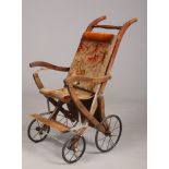 An early 20th century metamorphic child's push chair.