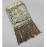 A Cantonese embroidered silk purse. With carved and pierced bone top rail and tassels to the