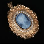 A 9 carat gold mounted cameo brooch pendant with a border of brilliant cut diamonds. Set with a