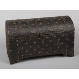 A 17th or 18th century Continental domed casket, probably Italian or Spanish. Clad with embossed