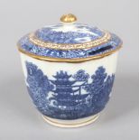 A Caughley fluted sucrier and cover. Printed in underglaze blue with the Pagoda pattern and