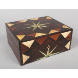 A 19th century Colonial rosewood parquetry inlaid box. With ivory and specimen wood inlays and