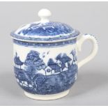 A Caughley custard cup and cover with scrolling loop handle and button finial. Printed in underglaze