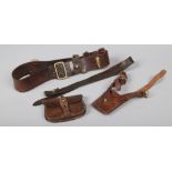 A World War I Officers Sam Browne leather belt with pouch, sword hanger and cross belt. Good