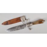 An 18th century German hunting knife in leather scabbard. With silver mounts and faceted agate