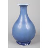 A 19th century Chinese pear formed vase. Decorated in Clair de Lune glaze. Six character Qianlong