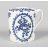 A Caughley coffee can with grooved loop handle. Printed in underglaze blue with the Fruit Wreath