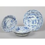 A Chinese Kangxi blue and white dish and set of four similar smaller examples. The larger painted in