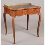 A 19th century satinwood ladies writing table with single side drawer. Having leather top, pierced