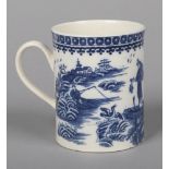 A small Caughley cylindrical mug with reeded strap handle. Printed in underglaze blue with the