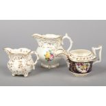 Three Rockingham cream jugs. One of square handle type with bridged spout pattern 753, and two