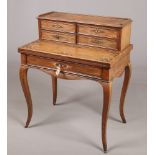 A Regency rosewood metamorphic writing desk converting to a fold over card table. Decorated with
